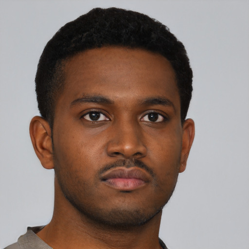 Neutral black young-adult male with short  brown hair and brown eyes