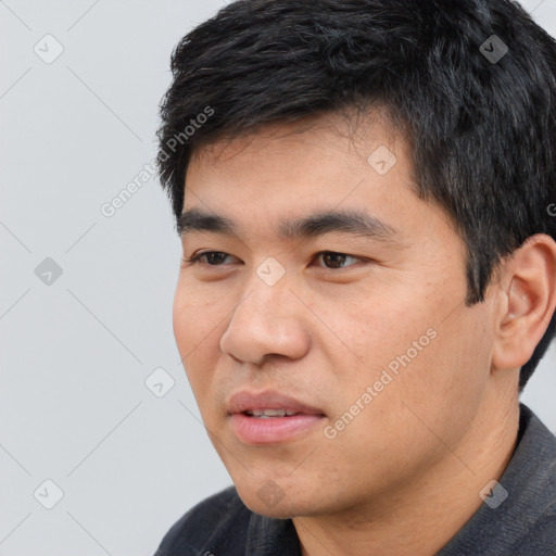 Neutral asian young-adult male with short  black hair and brown eyes