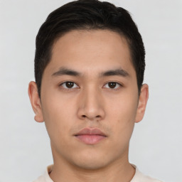 Neutral asian young-adult male with short  brown hair and brown eyes