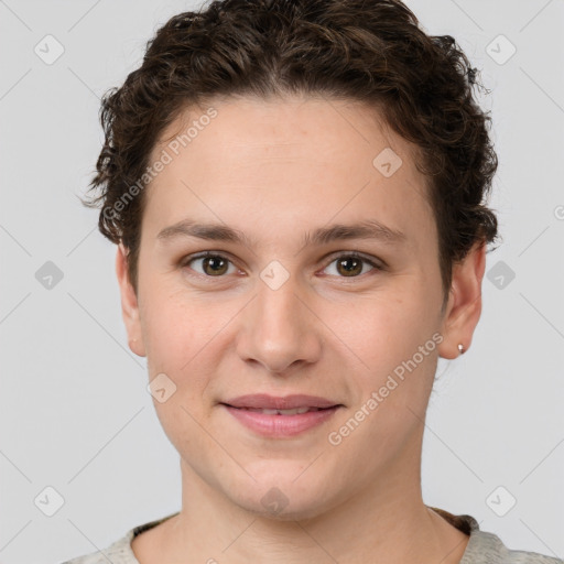 Joyful white young-adult female with short  brown hair and grey eyes