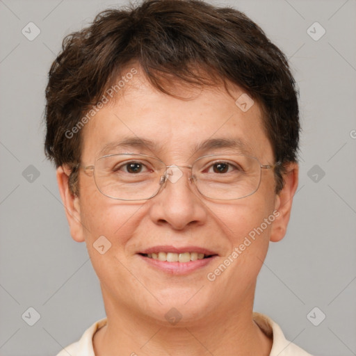 Joyful white adult female with short  brown hair and brown eyes