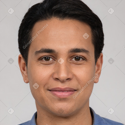 Joyful white young-adult male with short  black hair and brown eyes