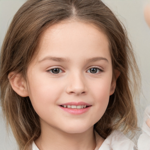 Joyful white child female with medium  brown hair and grey eyes