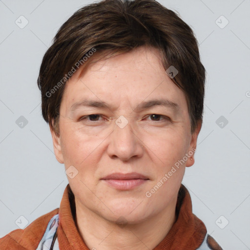 Joyful white adult female with short  brown hair and brown eyes