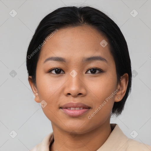 Joyful asian young-adult female with medium  black hair and brown eyes