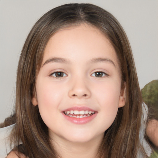 Joyful white child female with medium  brown hair and brown eyes