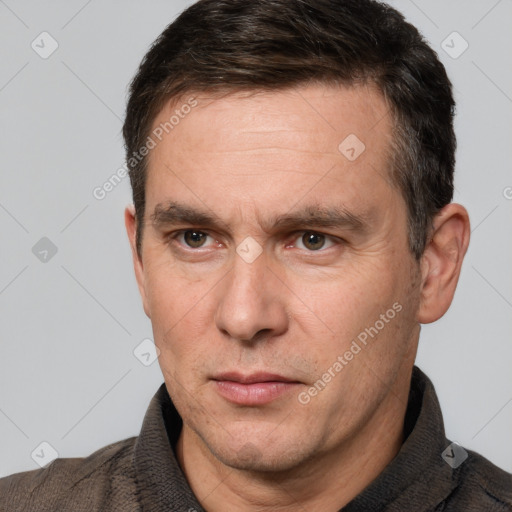 Neutral white adult male with short  brown hair and brown eyes