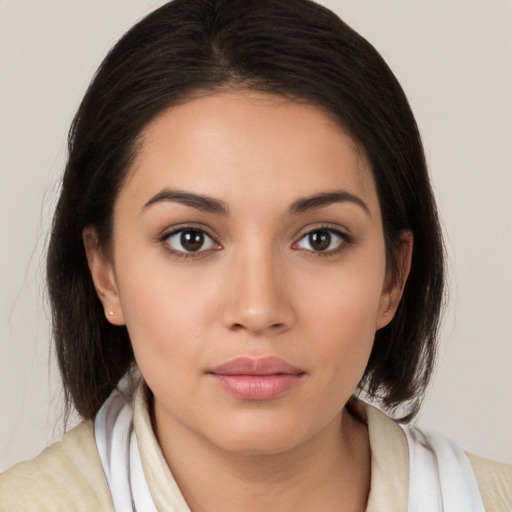 Neutral white young-adult female with medium  brown hair and brown eyes