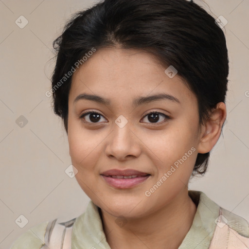 Joyful latino young-adult female with medium  brown hair and brown eyes