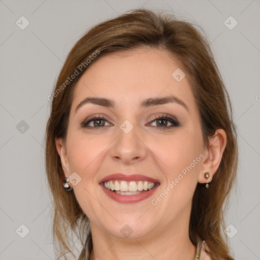 Joyful white young-adult female with long  brown hair and grey eyes