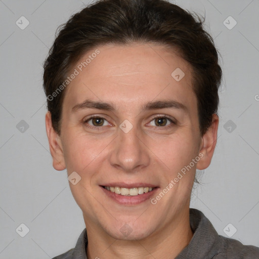 Joyful white adult female with short  brown hair and brown eyes