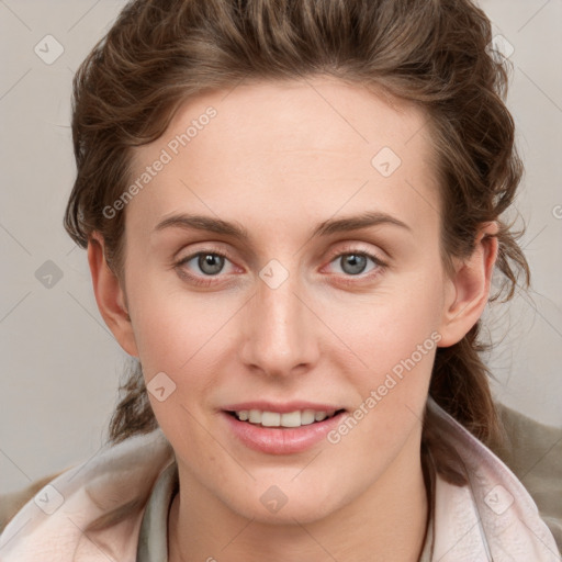 Joyful white young-adult female with medium  brown hair and blue eyes