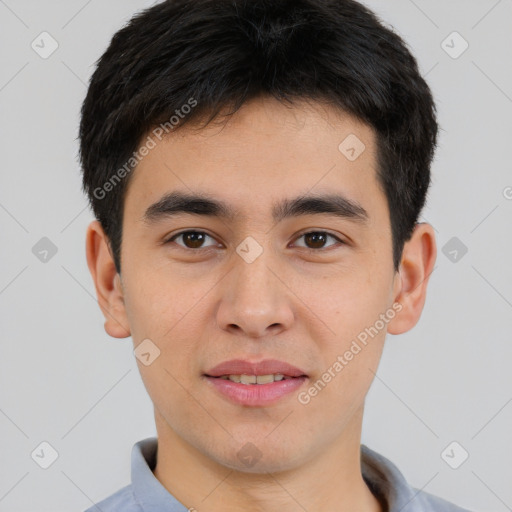 Joyful white young-adult male with short  black hair and brown eyes