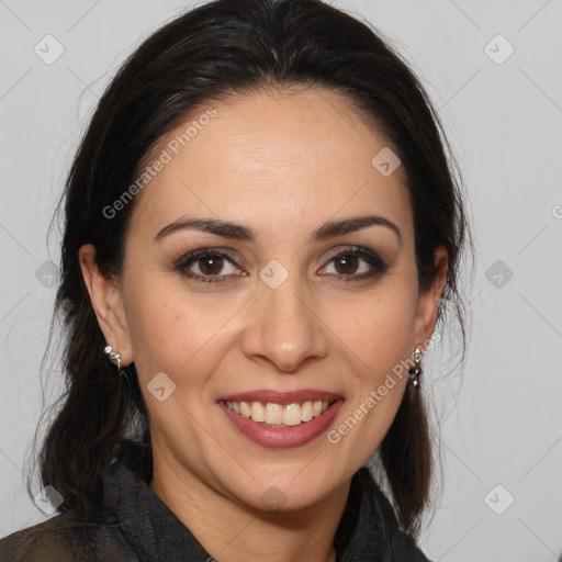 Joyful white adult female with medium  brown hair and brown eyes