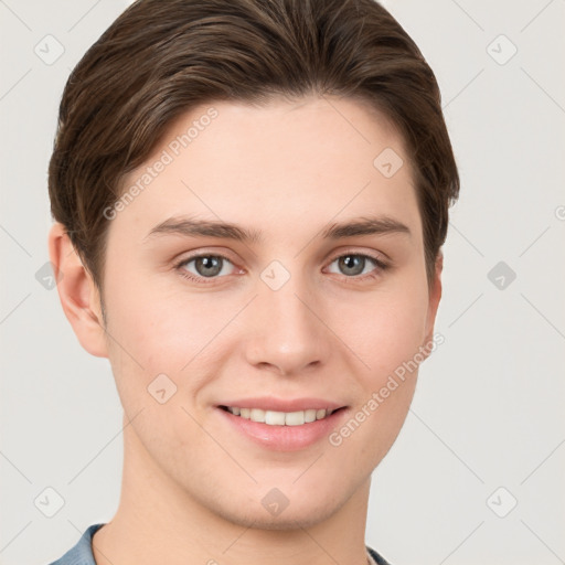 Joyful white young-adult female with short  brown hair and grey eyes