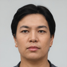 Neutral asian young-adult male with short  black hair and brown eyes