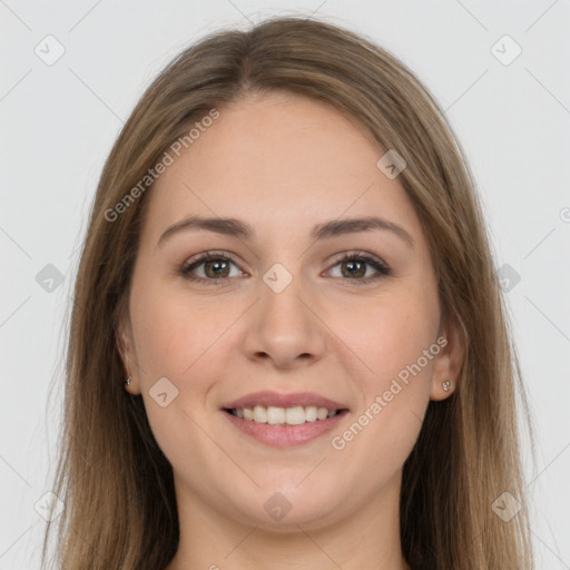 Joyful white young-adult female with long  brown hair and grey eyes