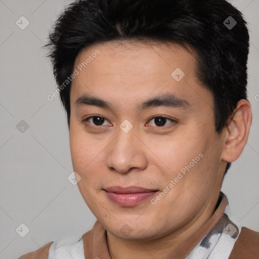 Joyful asian young-adult male with short  brown hair and brown eyes