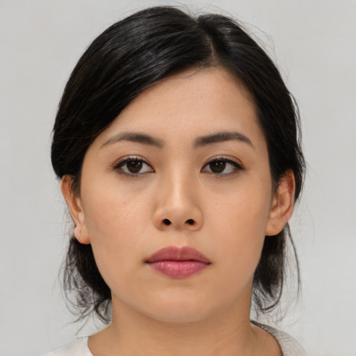 Neutral asian young-adult female with medium  black hair and brown eyes