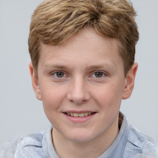 Joyful white young-adult male with short  brown hair and blue eyes