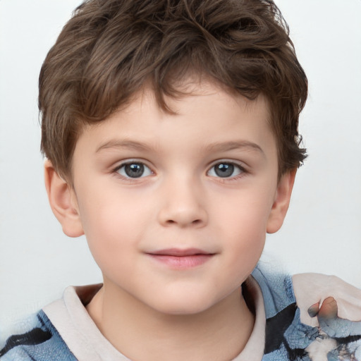 Joyful white child male with short  brown hair and grey eyes