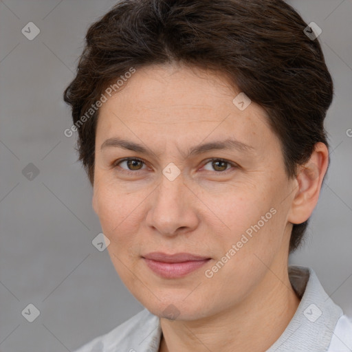 Joyful white adult female with short  brown hair and brown eyes