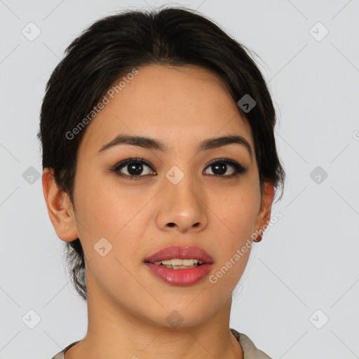 Joyful asian young-adult female with short  brown hair and brown eyes