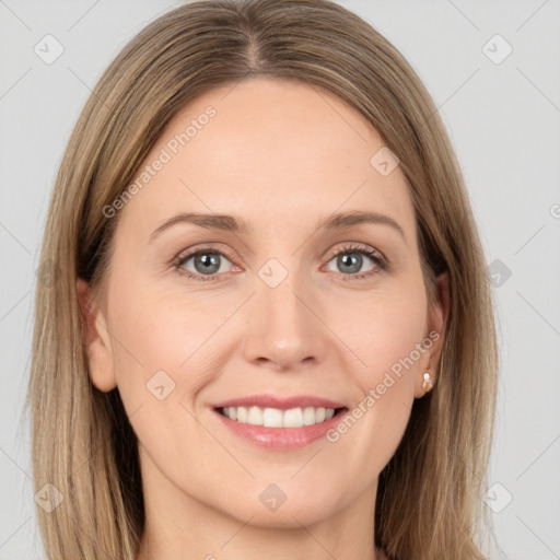 Joyful white young-adult female with long  brown hair and grey eyes