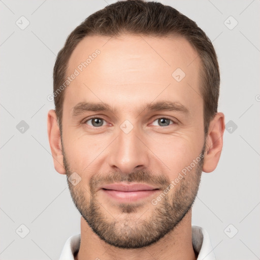 Joyful white young-adult male with short  brown hair and brown eyes