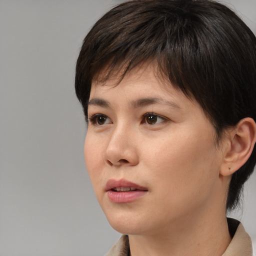 Neutral white young-adult female with medium  black hair and brown eyes