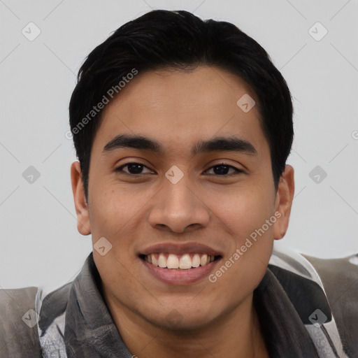 Joyful latino young-adult male with short  black hair and brown eyes