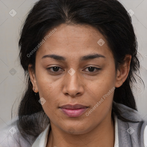 Joyful latino young-adult female with medium  brown hair and brown eyes