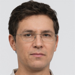 Neutral white adult male with short  brown hair and brown eyes