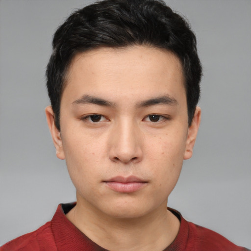Neutral white young-adult male with short  black hair and brown eyes