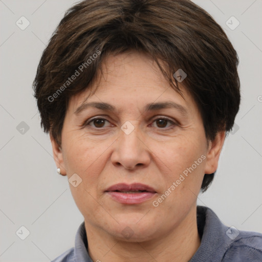 Joyful white adult female with short  brown hair and brown eyes