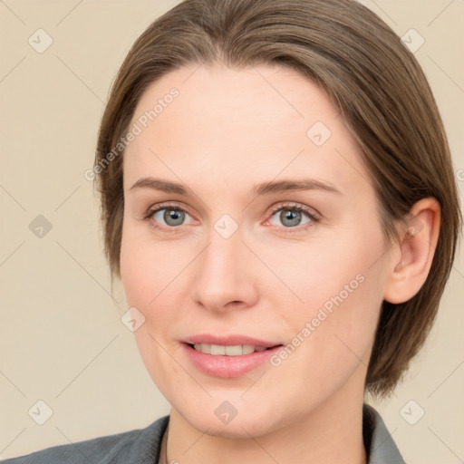 Joyful white young-adult female with medium  brown hair and blue eyes