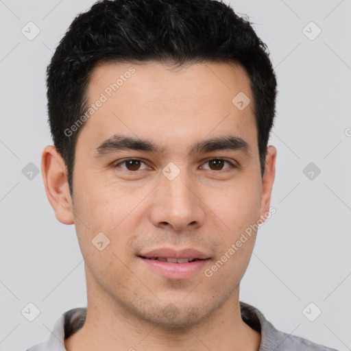 Joyful white young-adult male with short  black hair and brown eyes