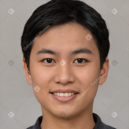 Joyful asian young-adult male with short  black hair and brown eyes