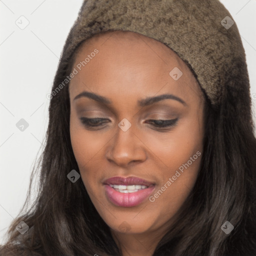 Joyful black young-adult female with long  brown hair and brown eyes