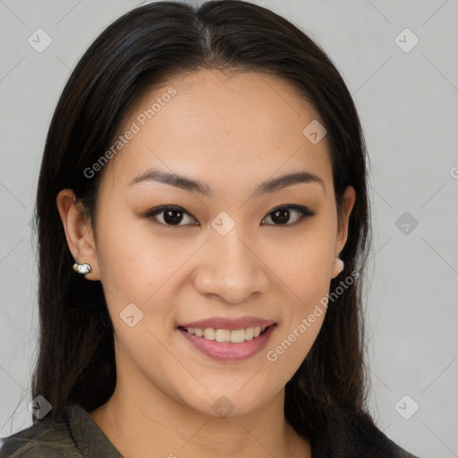 Joyful asian young-adult female with medium  brown hair and brown eyes