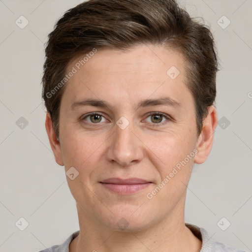 Joyful white adult female with short  brown hair and grey eyes