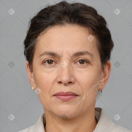 Joyful white adult female with short  brown hair and brown eyes