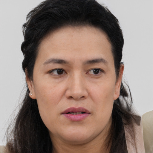 Joyful white young-adult female with short  black hair and brown eyes