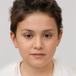 Joyful white child female with short  brown hair and brown eyes