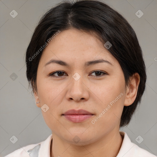 Joyful asian young-adult female with medium  brown hair and brown eyes