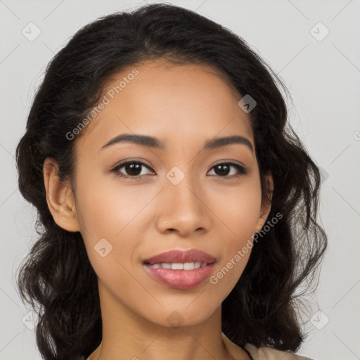 Joyful latino young-adult female with long  brown hair and brown eyes