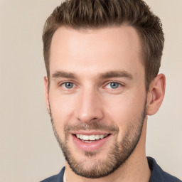 Joyful white young-adult male with short  brown hair and brown eyes