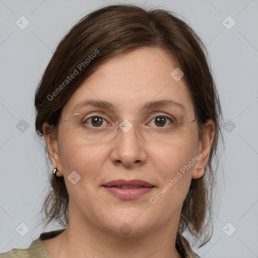 Joyful white adult female with medium  brown hair and grey eyes