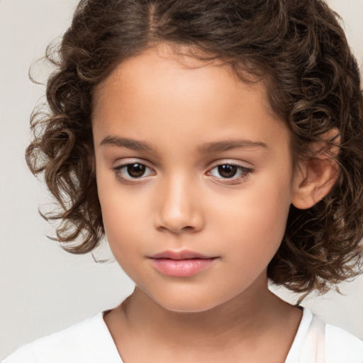 Neutral white child female with medium  brown hair and brown eyes