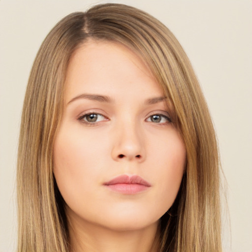 Neutral white young-adult female with long  brown hair and brown eyes